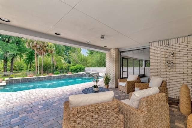 view of pool featuring a patio