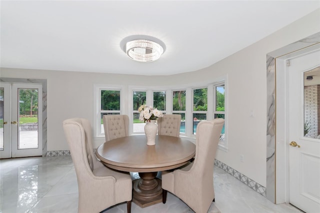 dining area featuring french doors