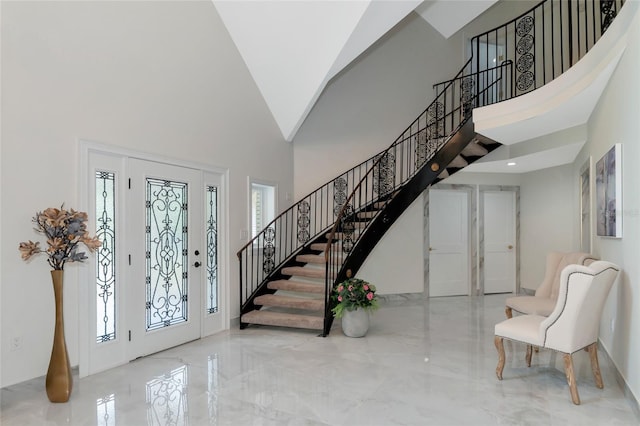 entrance foyer featuring a high ceiling