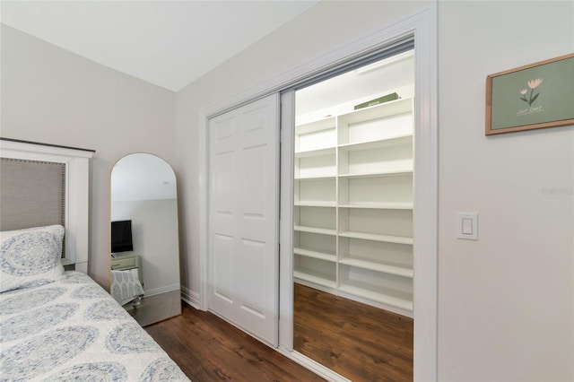 bedroom featuring dark hardwood / wood-style floors