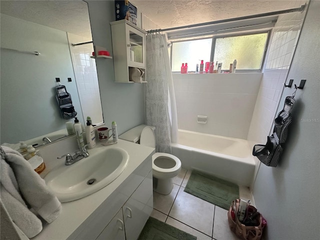 full bathroom featuring vanity, toilet, tile patterned flooring, and shower / bath combo with shower curtain