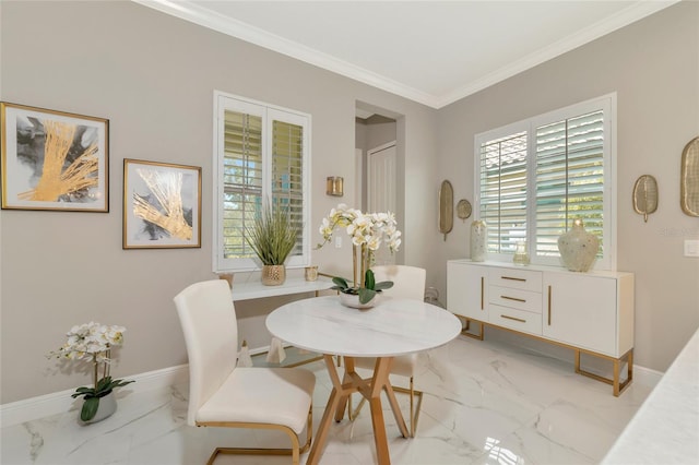 dining area featuring ornamental molding