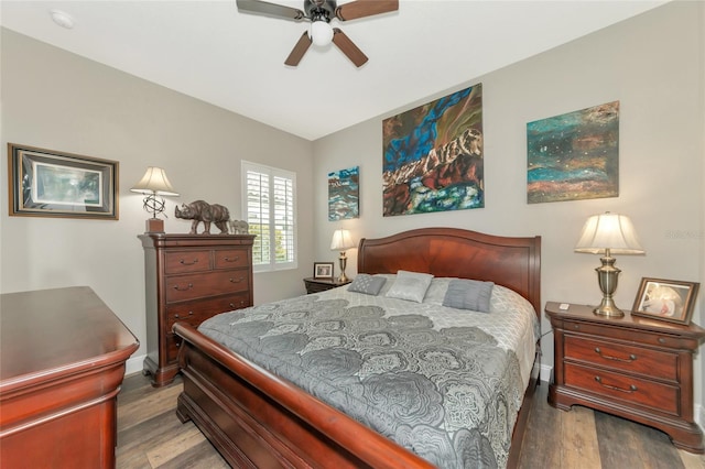 bedroom featuring wood-type flooring and ceiling fan