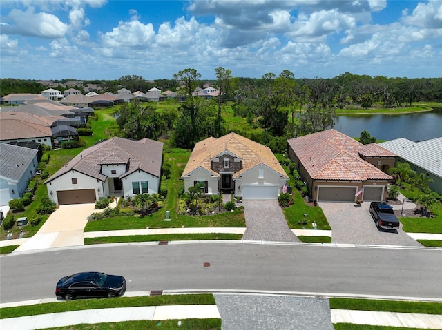 drone / aerial view with a water view