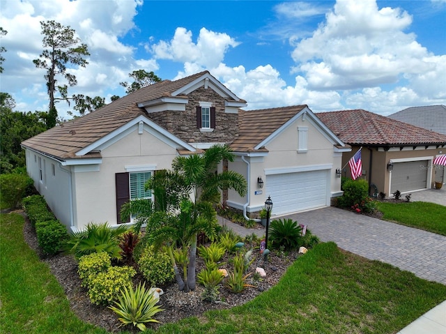 view of front of property featuring a garage