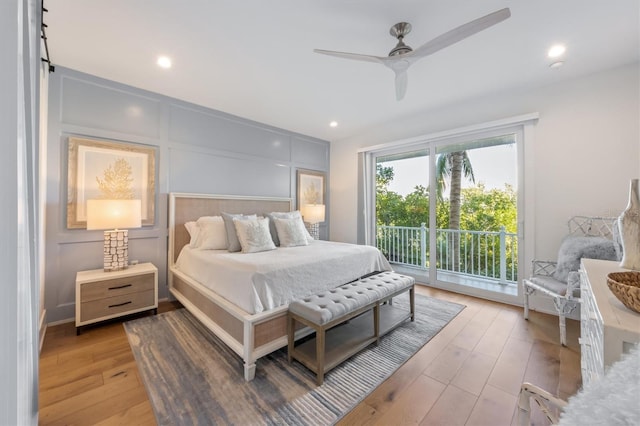 bedroom with access to outside, light wood-type flooring, and ceiling fan