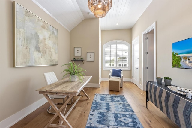 office featuring light wood-type flooring and vaulted ceiling