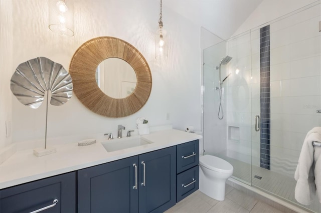 bathroom with a shower with door, toilet, tile patterned floors, and vanity