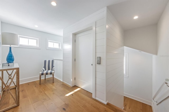 sitting room with light hardwood / wood-style floors