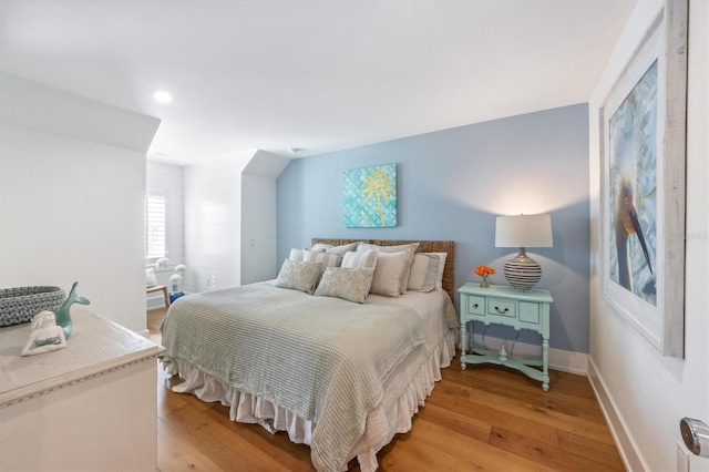 bedroom featuring light hardwood / wood-style flooring