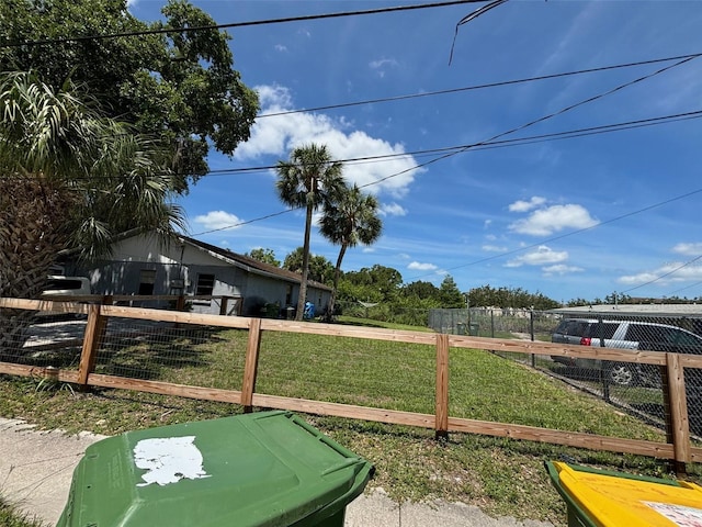 view of yard with fence