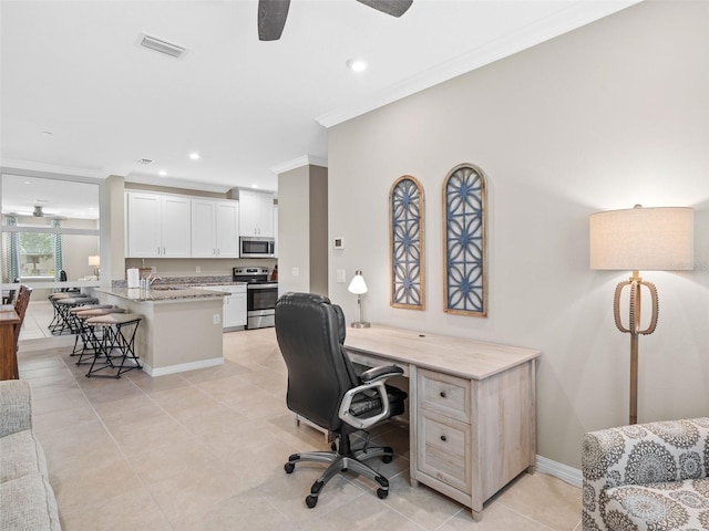 tiled office featuring ceiling fan, crown molding, and sink