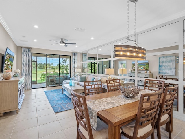 tiled dining room featuring ceiling fan