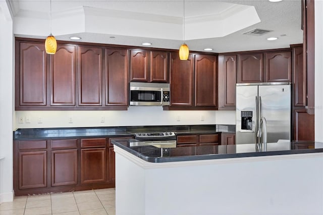 kitchen featuring crown molding, light tile patterned floors, hanging light fixtures, and appliances with stainless steel finishes