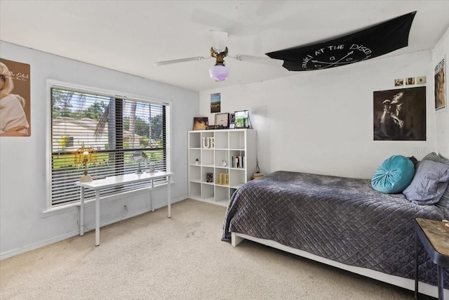 bedroom featuring ceiling fan and carpet floors