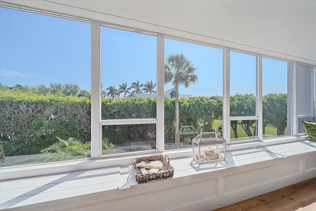 unfurnished sunroom with a wealth of natural light