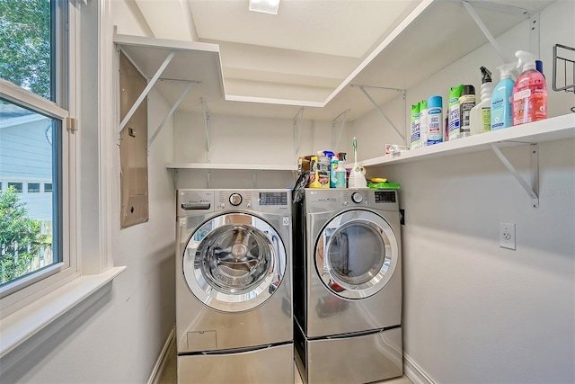 washroom featuring washing machine and dryer