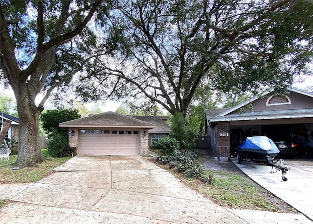 ranch-style house featuring a garage