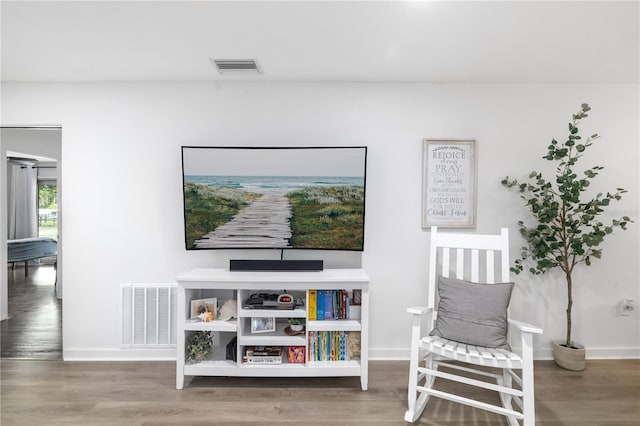 living area featuring hardwood / wood-style flooring