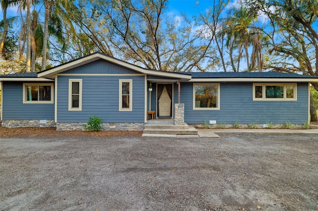 single story home featuring crawl space