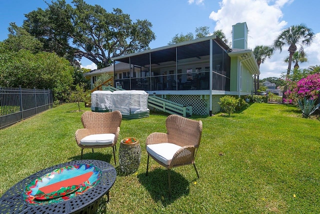 view of yard with a sunroom