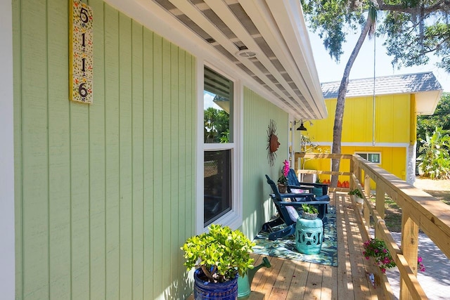 wooden balcony with a wooden deck