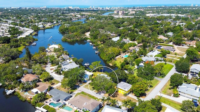 birds eye view of property featuring a water view