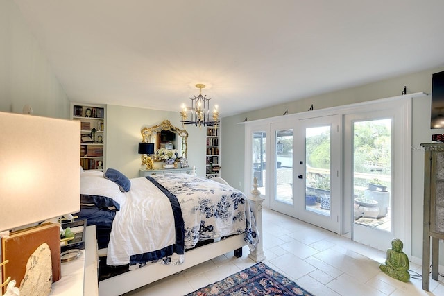 bedroom with access to exterior, french doors, light tile patterned flooring, and a notable chandelier