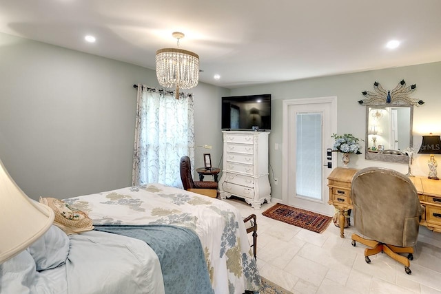 bedroom featuring a notable chandelier