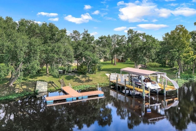 view of dock featuring a water view and a lawn