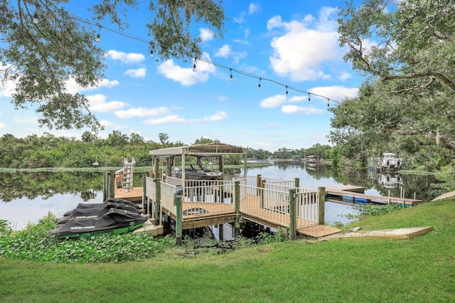 16990 River Boat Bnd, Alva, FL 33920 - dock area featuring boat lift, a water view, and a lawn