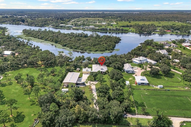 birds eye view of property featuring a water view