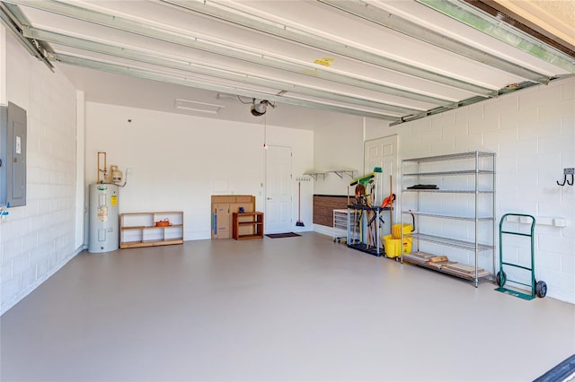 garage with electric water heater and electric panel