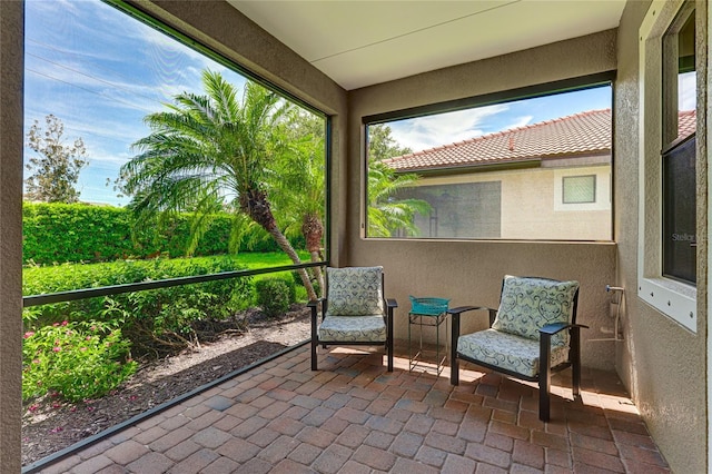 sunroom / solarium featuring a wealth of natural light