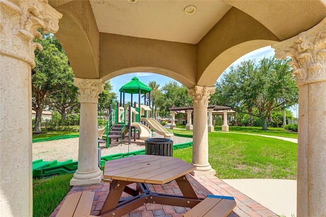 view of patio featuring a playground