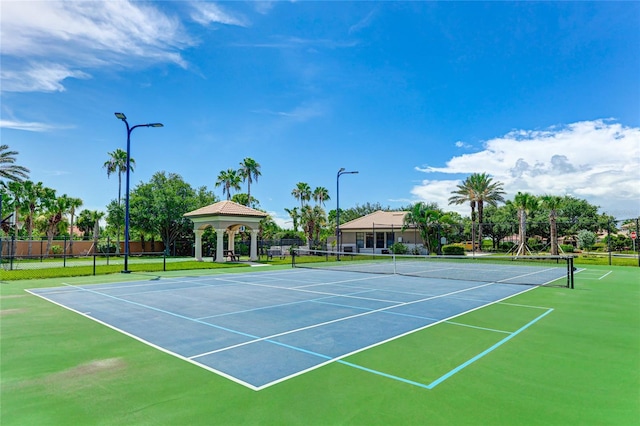 view of tennis court with a gazebo and basketball court