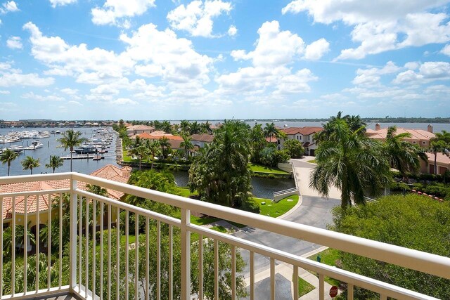 balcony featuring a water view