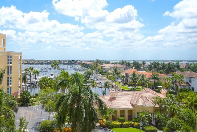 birds eye view of property featuring a water view