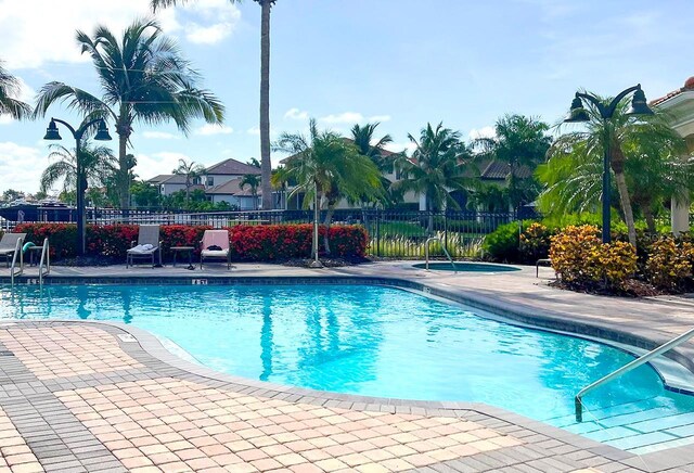 view of pool featuring a patio area