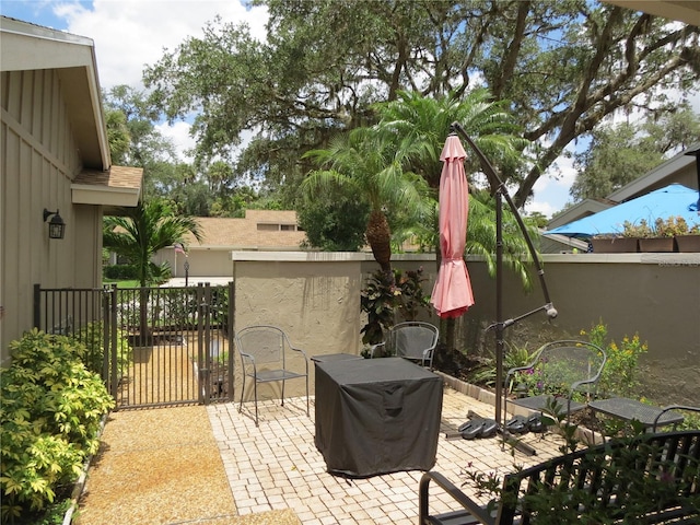 view of patio with fence