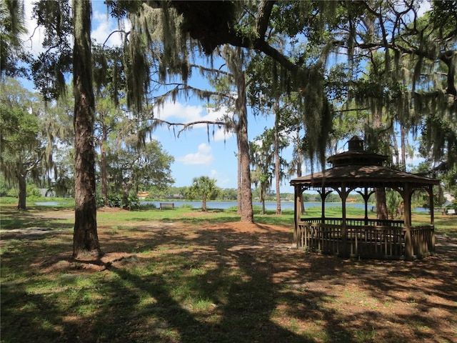 view of property's community featuring a gazebo and a water view