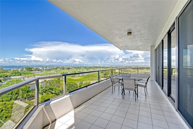 balcony featuring a water view