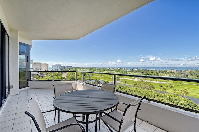 balcony featuring a water view