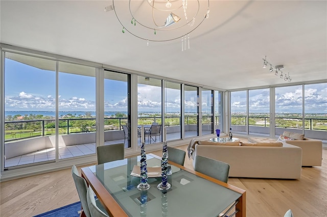 sunroom with a water view