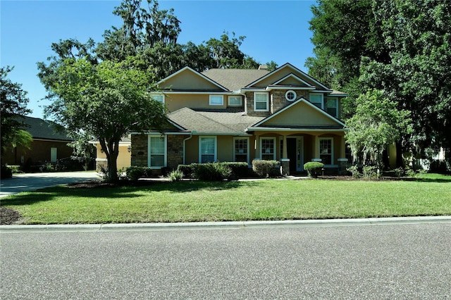 view of front of home featuring a front yard