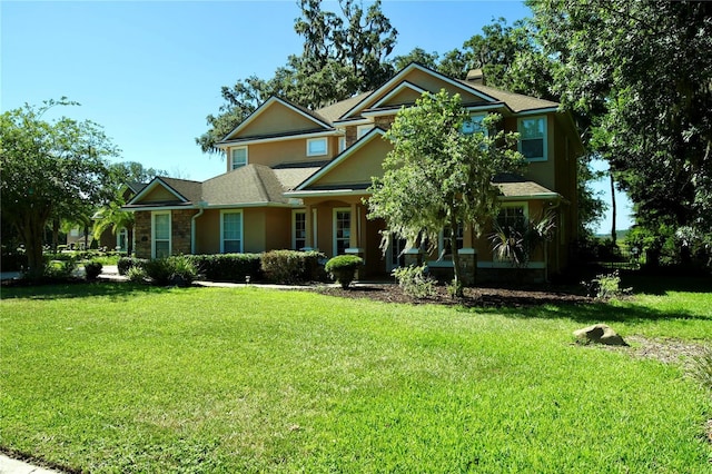 view of front of home featuring a front lawn