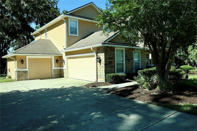 view of front of property with a garage