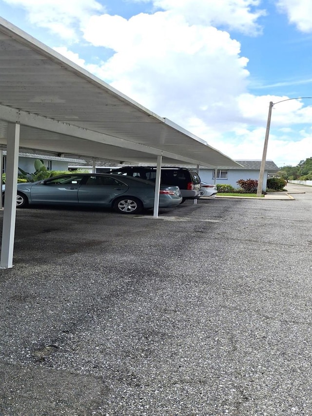 view of car parking featuring a carport