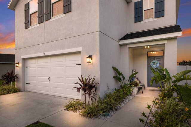 exterior space with a garage