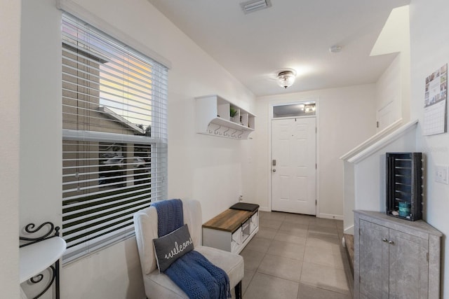 interior space featuring tile floors